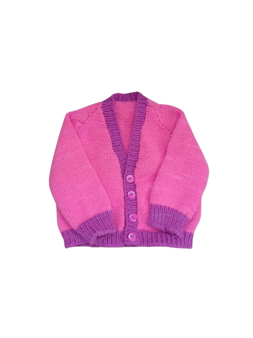 Pretty in Pink – Girls’ Knitted Cardigan with Purple Trim.