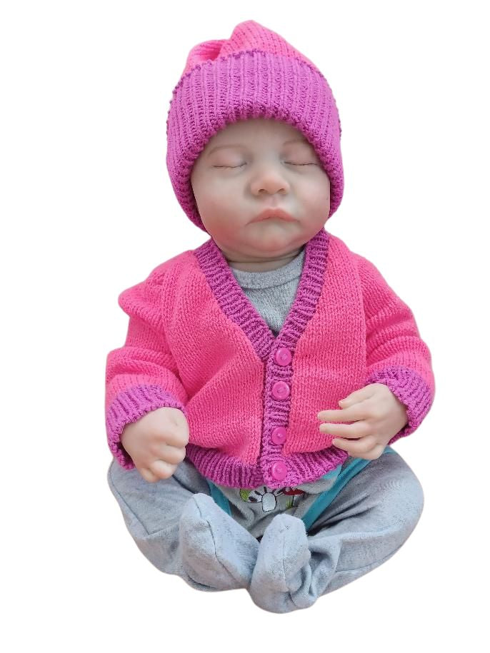 Pretty in Pink – Girls’ Knitted Cardigan with Purple Trim with a matching hat.