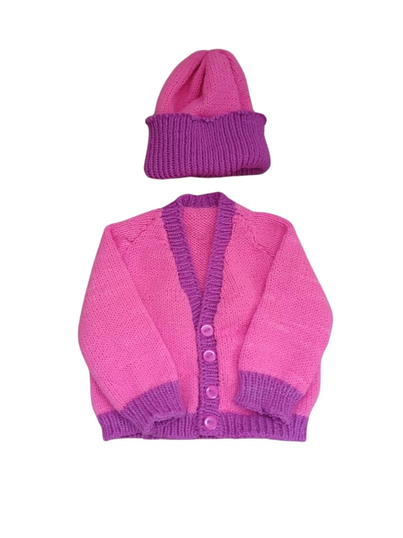Pretty in Pink – Girls’ Knitted Cardigan with Purple Trim with a matching hat.