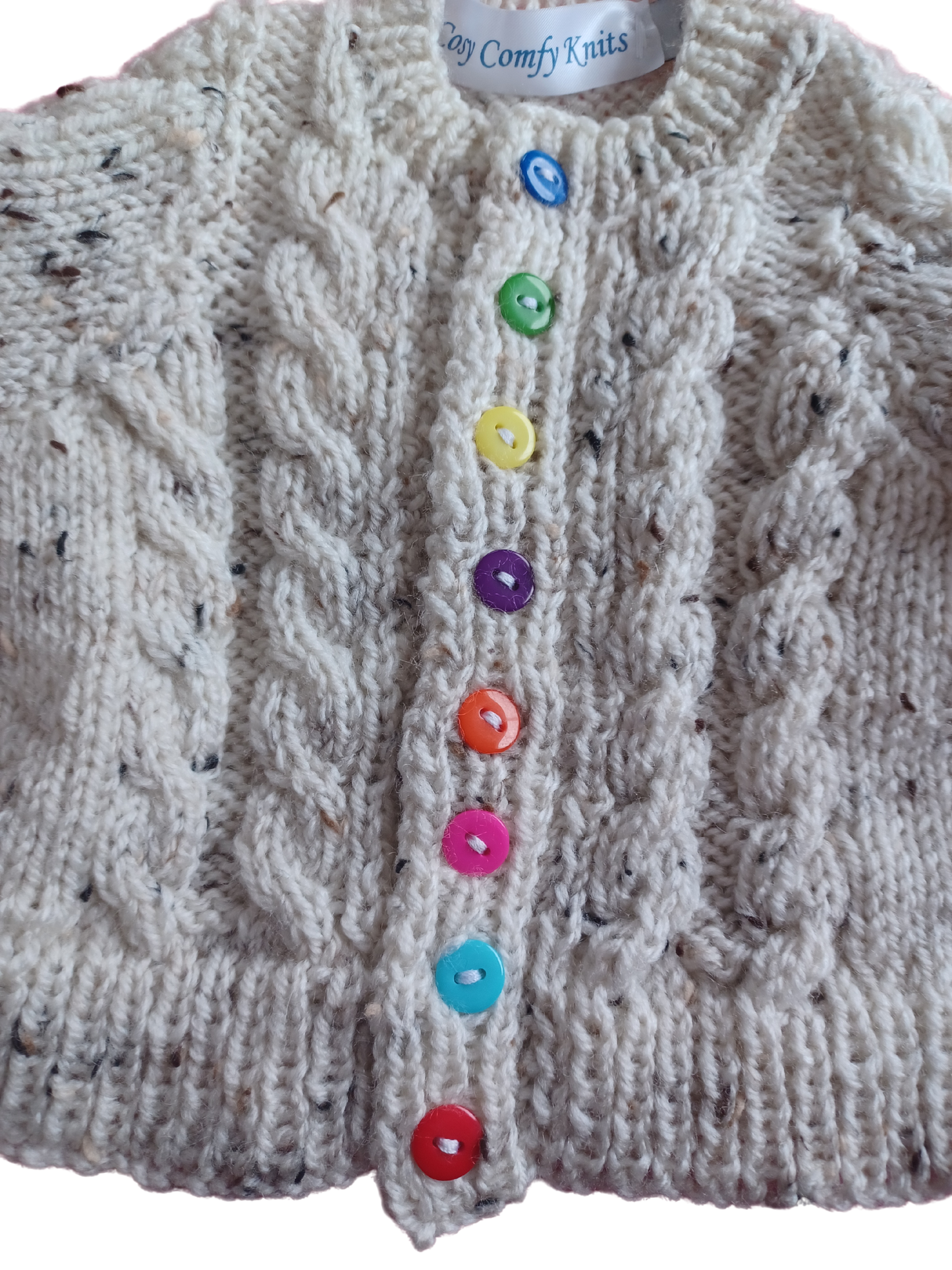 Lovely long sleeved Cardigan, in a tweed yarn with cable fronts panels and sleeves