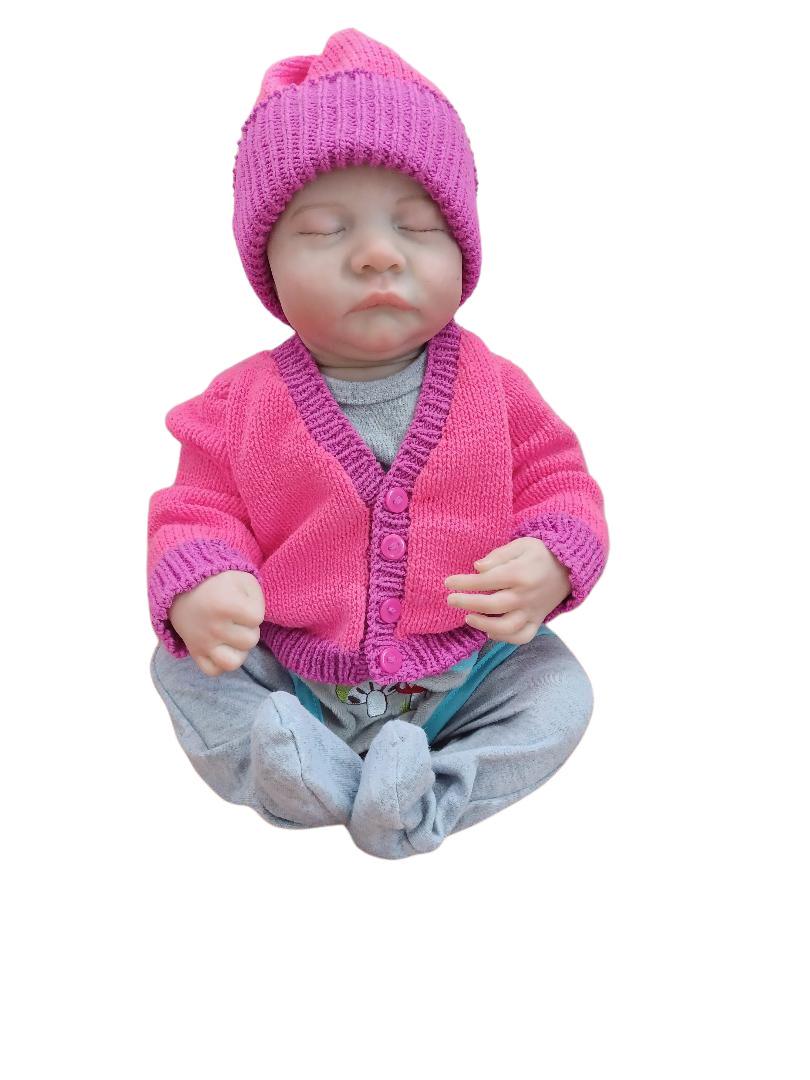 Girls' Knitted Pink Cardigan: Purple Trim, Soft Yarn.