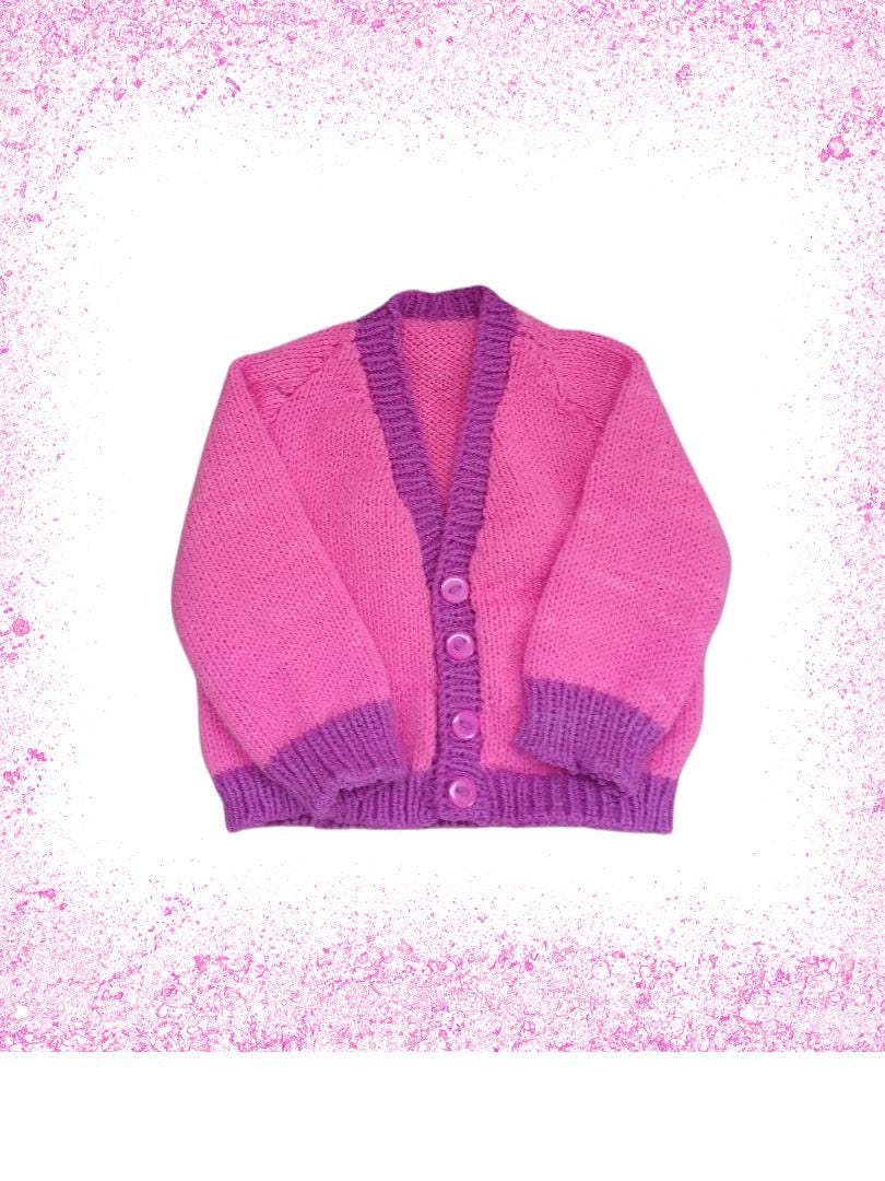 Pretty in Pink – Girls’ Knitted Cardigan with Purple Trim.