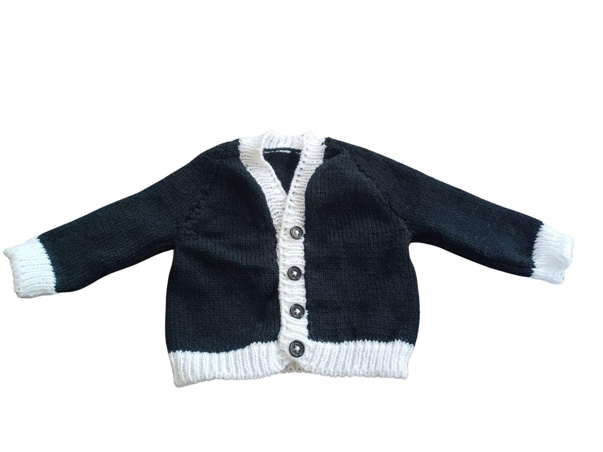 Black Cardigan with contrasting White Ribbing Trim.